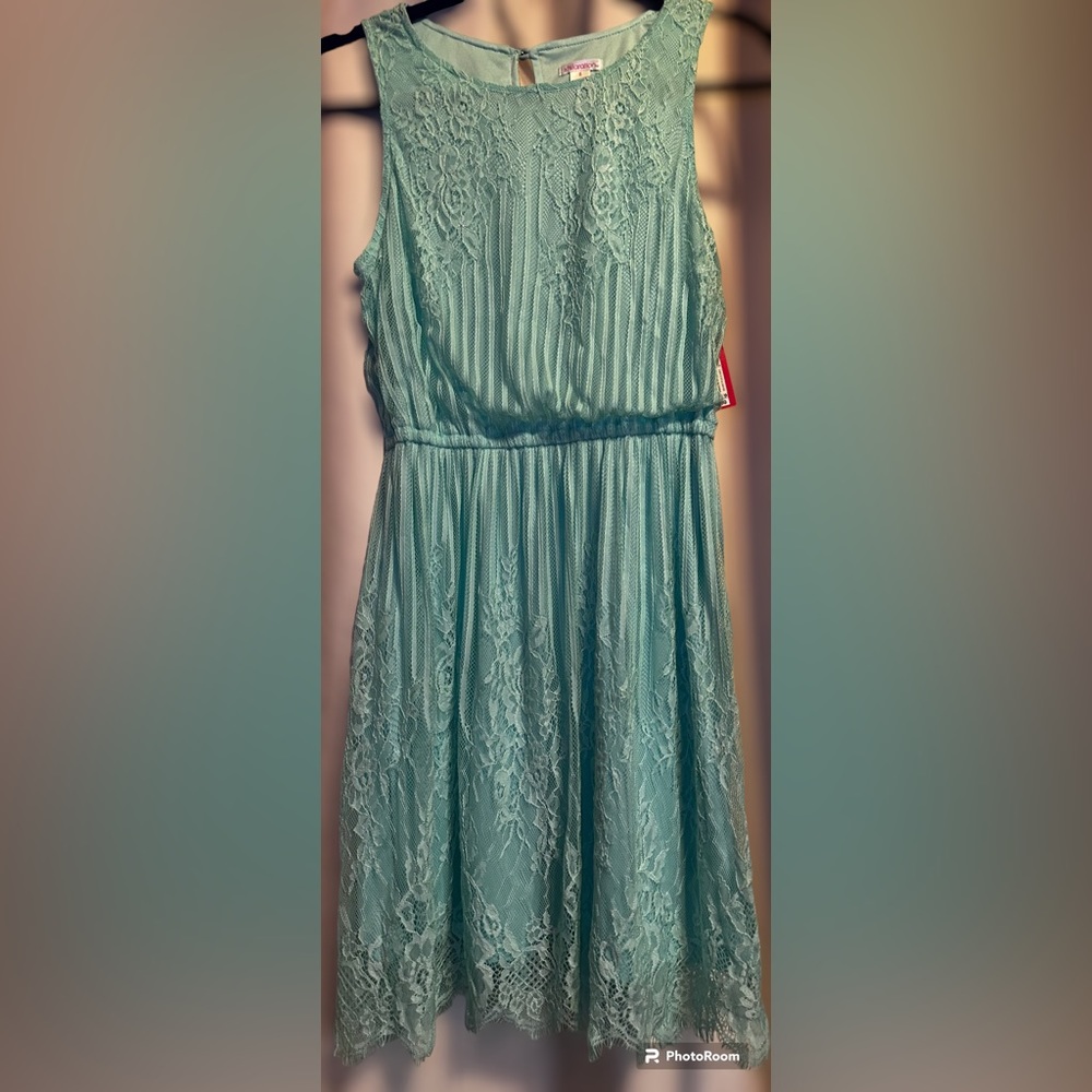 Brand New Turquoise Lacey Dress. Size Small. Tags still Attached. Cinched Waist.